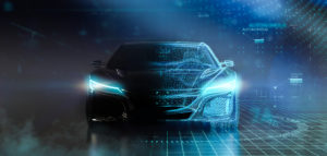 Front view of a futuristic automotive with its headlights on.